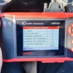 Close-up of Launch CRP123 Professional OBD2 Scanner Displaying Diagnostic Data