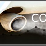 Vehicle emissions testing concept illustrating CO2 output, relevant to OBD2 Mode 6 diagnostics.