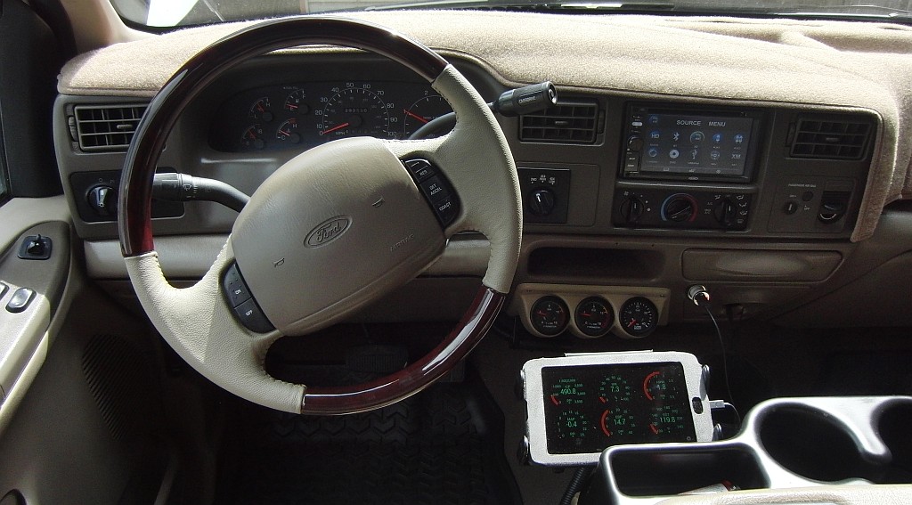 Customizable digital dashboard display using an OBD2 app in 2016, showing real-time vehicle parameters.